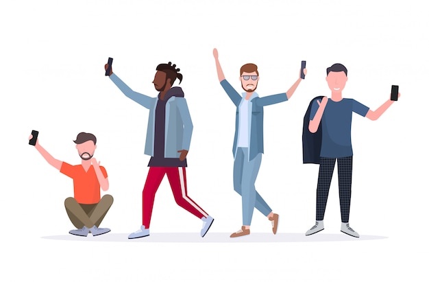 Vector mix race men taking selfie photo on smartphone camera casual male cartoon character standing together in different poses white background  full length horizontal