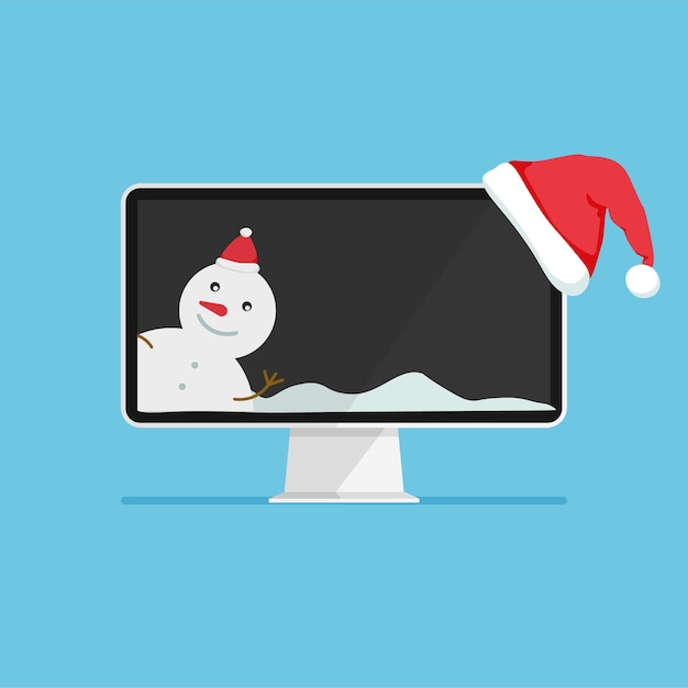 Monitor con cappello di babbo natale pupazzo di neve sullo schermo computer come un regalo per capodanno e natale