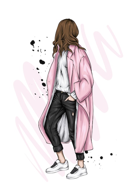 Mooi meisje in een stijlvolle jas en schoenen
