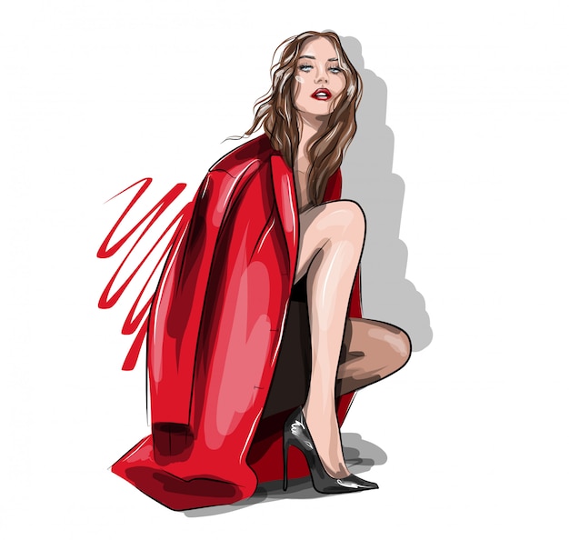 Mooie vrouw in een rood jasje en hoge hakken. Meisje poseren zittend. Mooi meisje van modelverschijning. Mode en stijl.