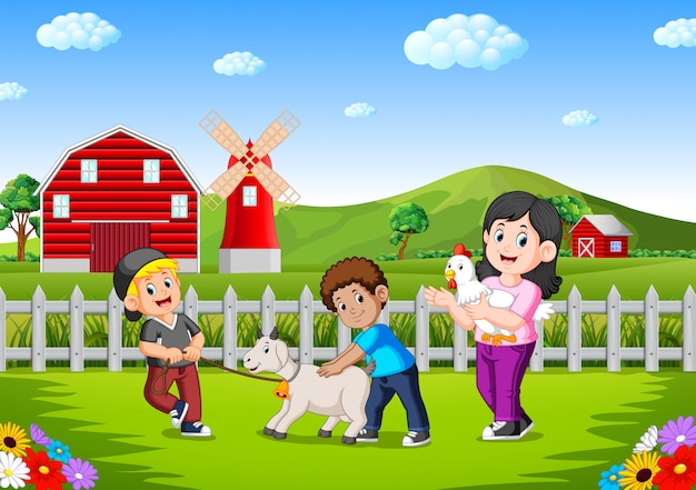 mother and kids on the farm with animal livestock