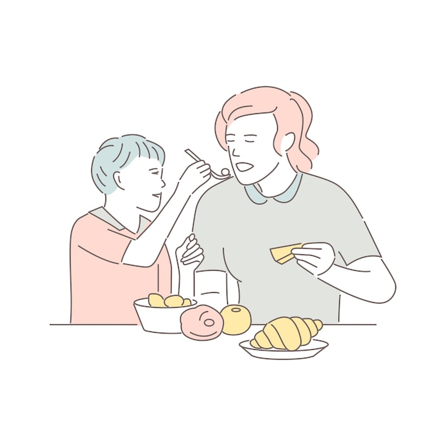 Madre e figlio che mangiano a tavola bella donna con bambino mangia piatti nel ristorante isolato su sfondo bianco