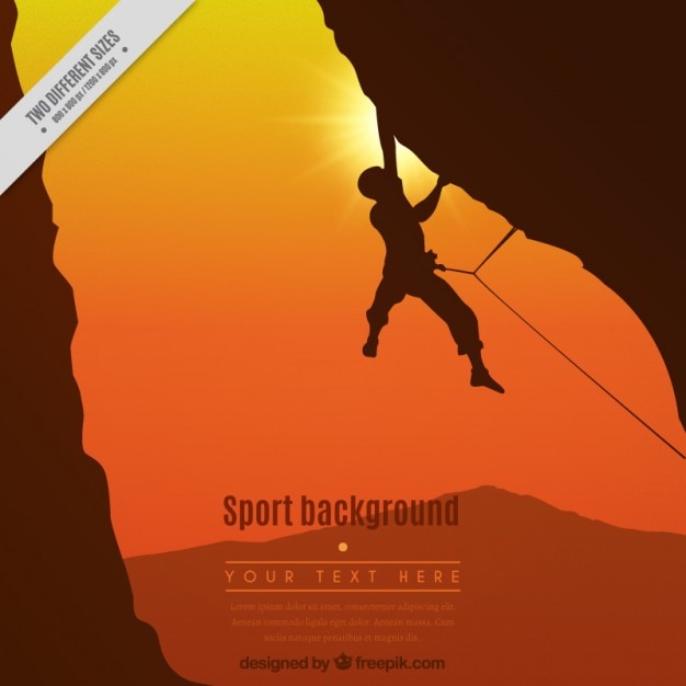 Vector mountain climber in a sunset background