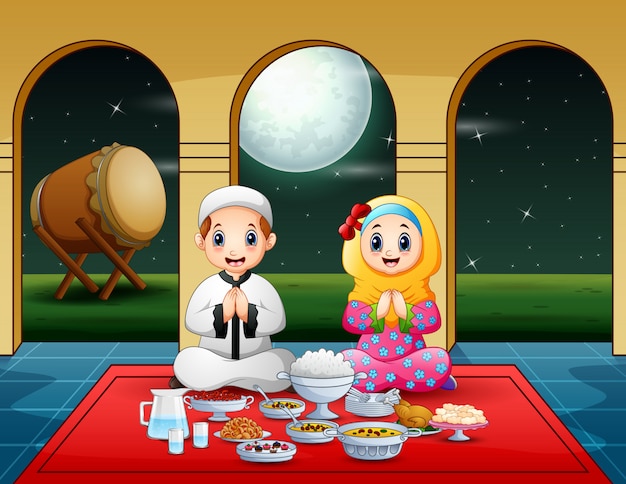 Muslim couple pray together before break fasting