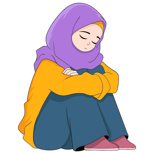 Muslim girl wearing a hijab is sitting pensively sad