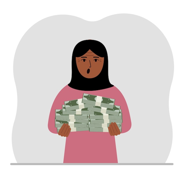 A muslim woman is holding a large pile of paper money