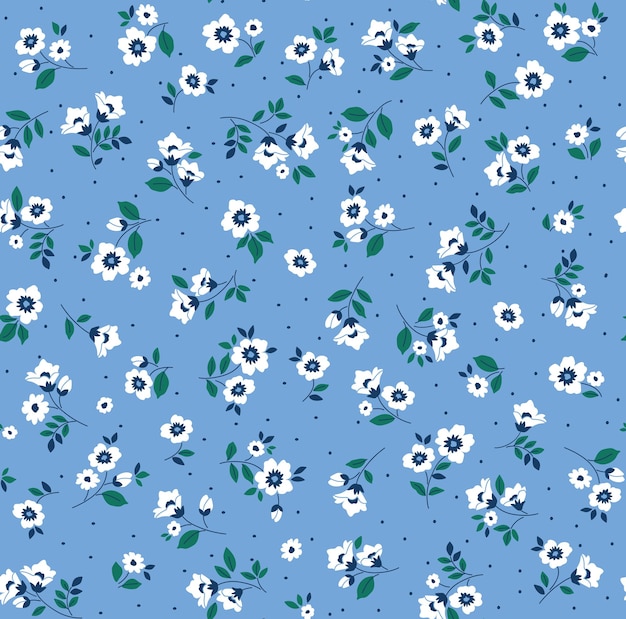 Naadloos bloemenpatroon voor ontwerp Kleine witte bloemen Blauwe achtergrond Leuke vintage print