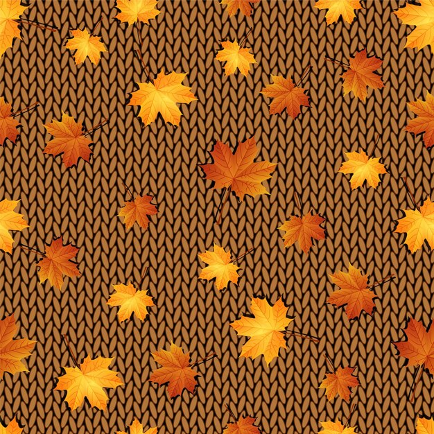 Naadloze patroon Herfst esdoorn bladeren op de gebreide achtergrond