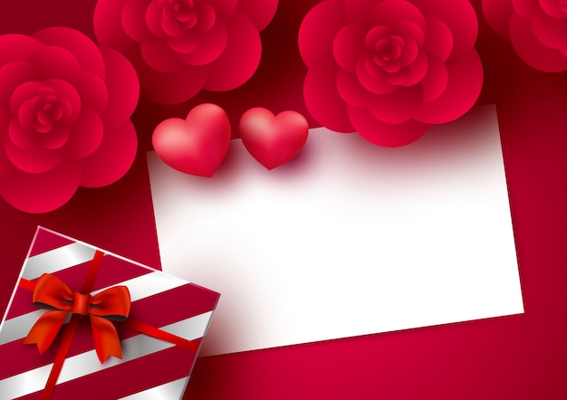 Nam bloemen en lege witboekkaart met hart toe op rode achtergrond voor de dag van de valentijnskaart