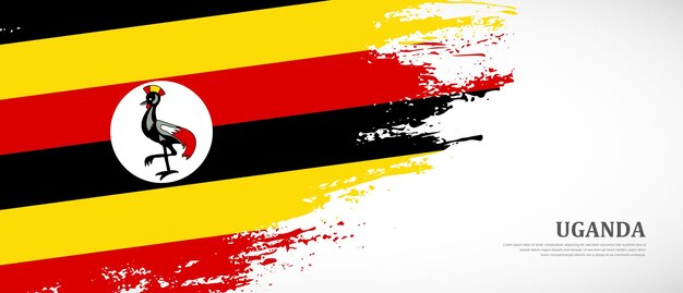 National flag of Uganda with hand drawn textured brush flag banner background