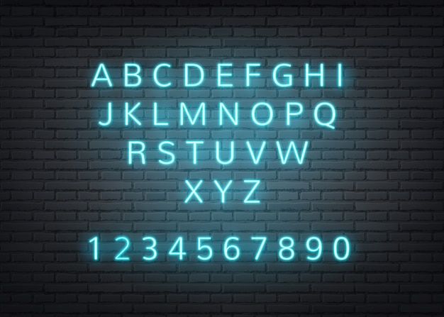 Neon alphabet retro letters on brick wall