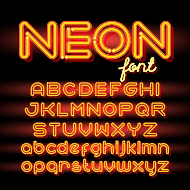 Fonte di alfabeto di luce al neon. lettere del tubo al neon su sfondo scuro.