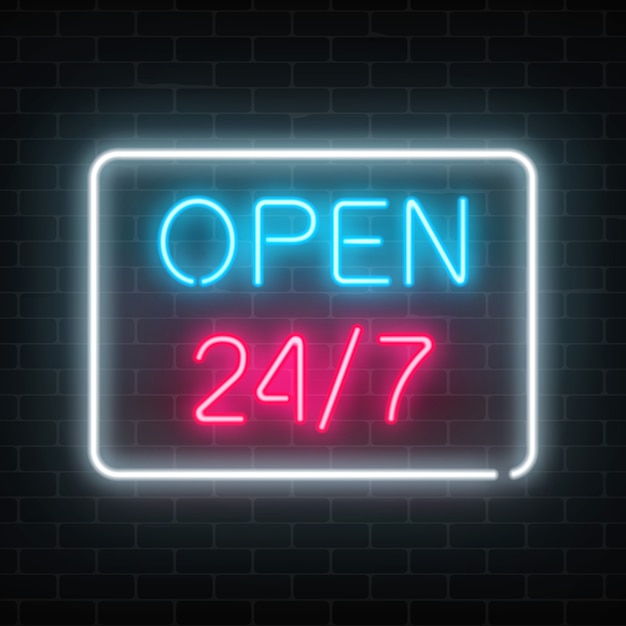 Neon open 24 uur teken op een bakstenen muur