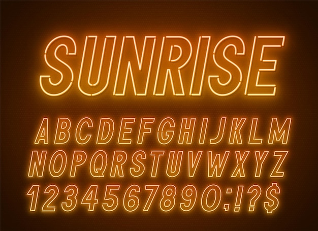 Neon oranje gele lettertype licht alfabet met cijfers