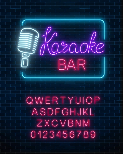 Neon signboard of karaoke music bar with alphabet.