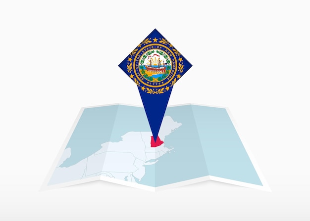 ニューハンプシャー州は折りたたまれた紙の地図に描かれており,ニューハンプシュア州の旗が付いている.