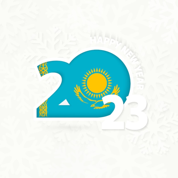 雪の結晶の背景にカザフスタンの新年 2023