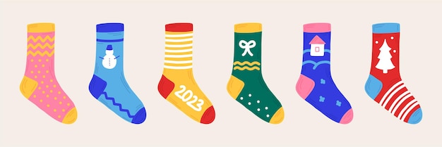 New Year set Christmas socks in hand drawn style with ornament Isolated icons stickers elements