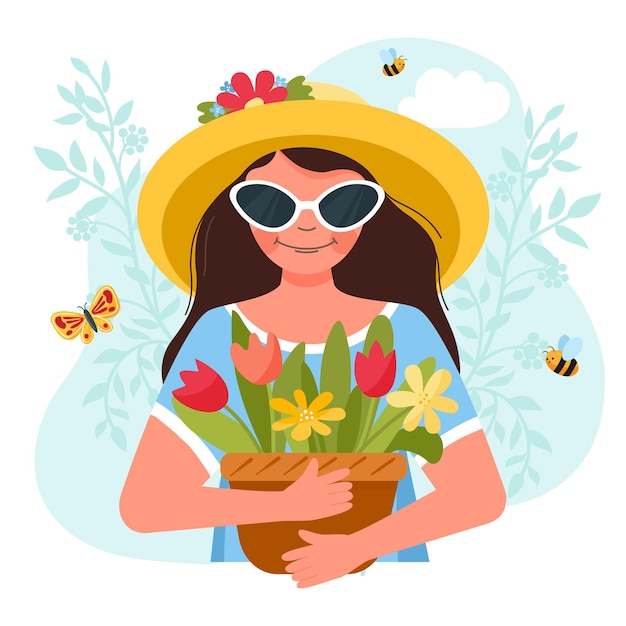 Nice girl in a hat with flowers in her hands.