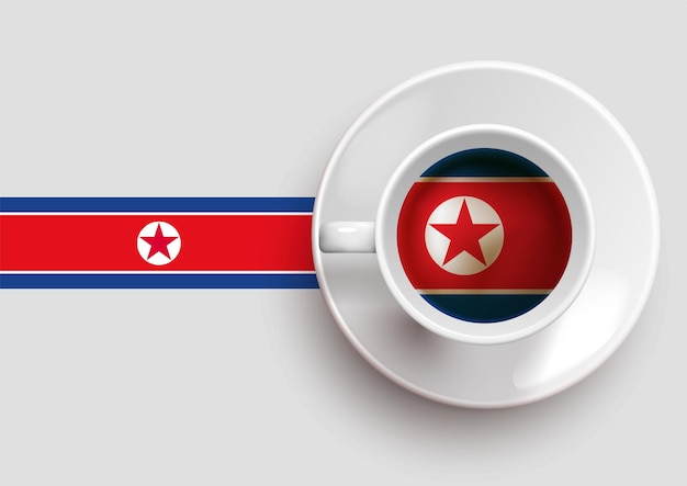 上面図においしいコーヒーカップと北朝鮮の旗