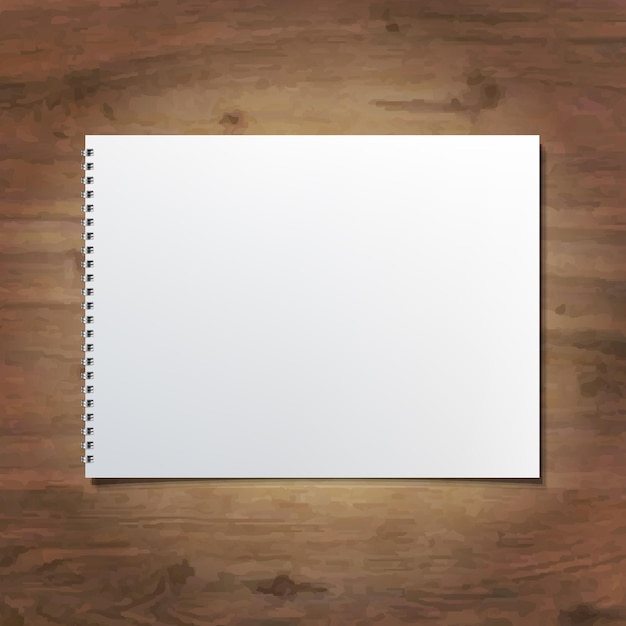 Vector notebook on wooden background