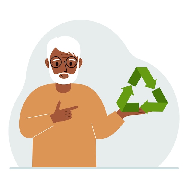 Старик держит в руках зеленый знак вторичной переработки или экологии