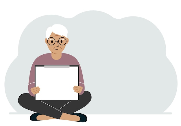 한 노인이 다리를 꼬고 앉아 텍스트에 대한 흰색 읽기 시트가 있는 클립보드를 손에 들고 있습니다.