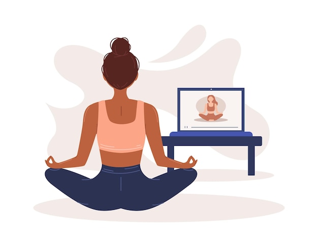 Online yoga The girl does yoga and meditates at home online Home sport Harmony and meditation Banner