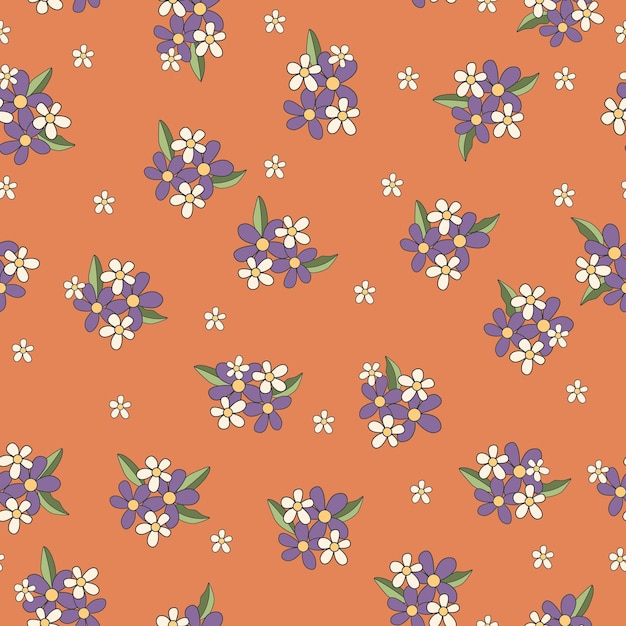 Orange background with purple and white flowers and leaves on a brown background.