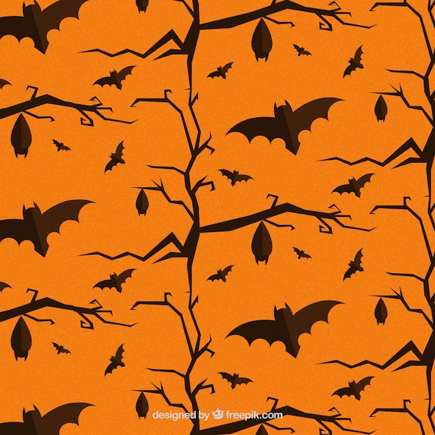 Vector orange pattern with black bats and trees