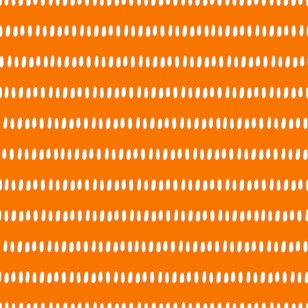 白い小さな線を持つオレンジ色のシームレスなパターン。