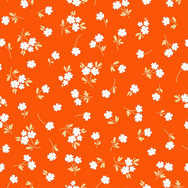 Oranje naadloos patroon met witte bloemen