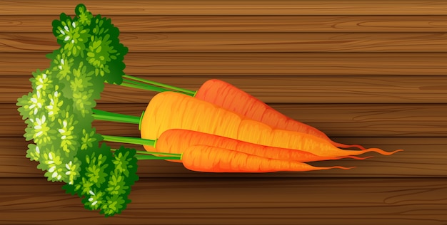 Organic carrot on wooden table