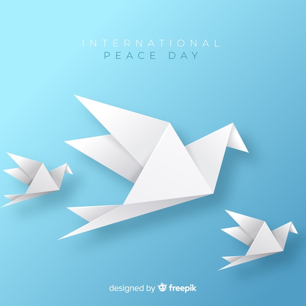 Origami peace day background with dove