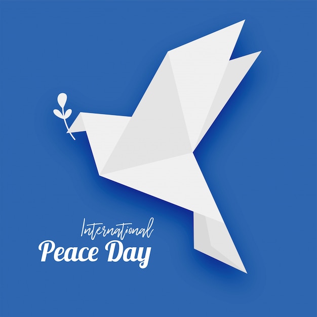 Vector origami pigeon with leaf symbol of peace