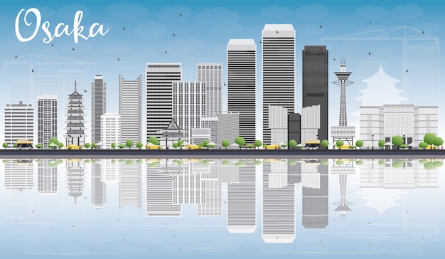 Osaka Skyline with Gray Buildings, Blue Sky and Reflections.