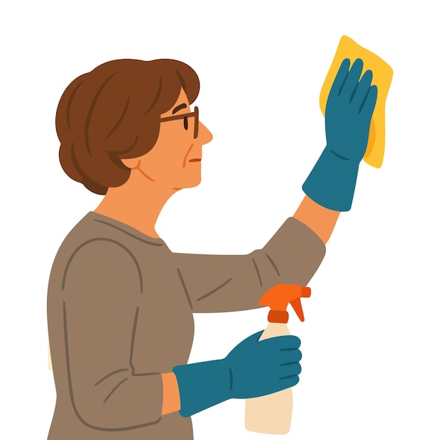 Oudere vrouw die een muur schoonmaakt met een spuitfles