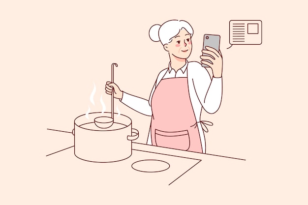 Oudere vrouw koken met recept op mobiel