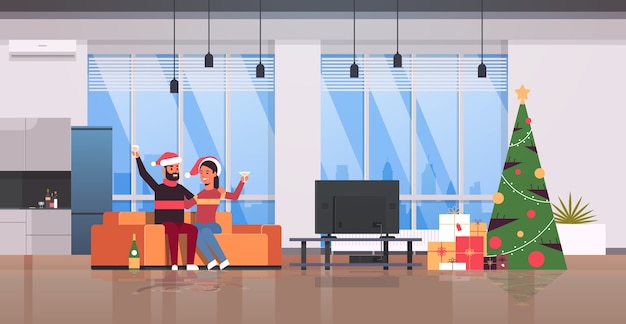 Paar drinken champagne vrolijk kerstfeest gelukkig nieuwjaar vakantie viering vooravond partij concept man vrouw in kerstmuts zittend op de bank modern woonkamer interieur volledige lengte horizontaal vector illust