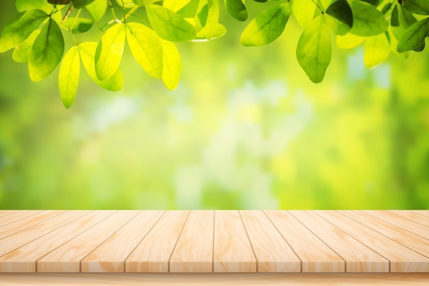 Vector painted illustration vector wood table floor and beautiful natural green leaf abstract blurred bokeh light background.