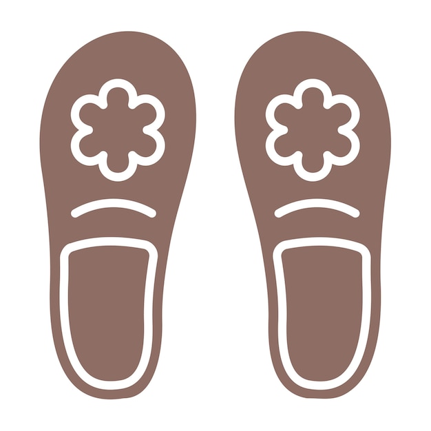 a pair of brown slippers with a flower on the bottom