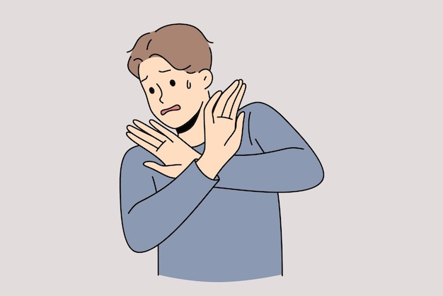 Panic stop and prevention concept Young stressed man showing stop crossed hands sign feeling