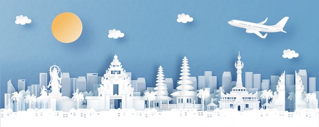 Panorama view of denpasar, bali. indonesia with temple and city skyline with world famous landmarks in paper cut style illustration