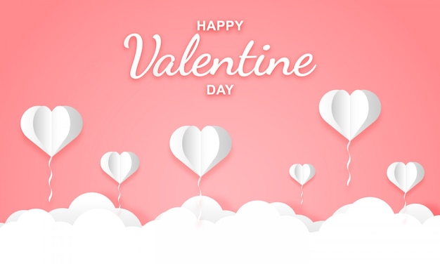 Paper art of bright pink skies with heart shaped balloons for Valentine's Day