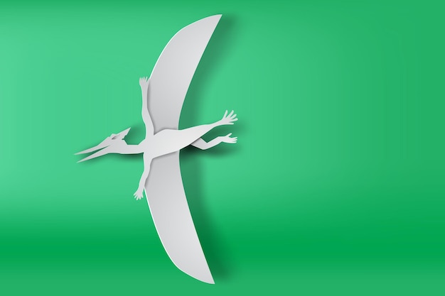 Paper art of Pteranodon dinosour on green background vector