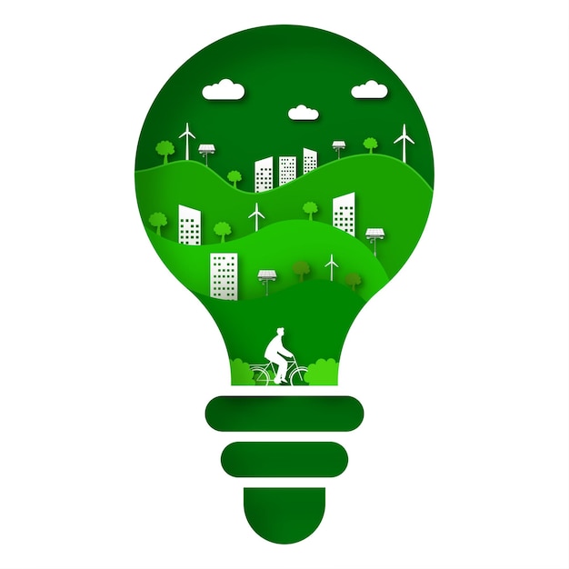 Вырезанная из бумаги лампочка экологии со зданиями Велосипедист Ветряные мельницы Панели солнечных батарей Деревья Облака на белом и зеленом фоне