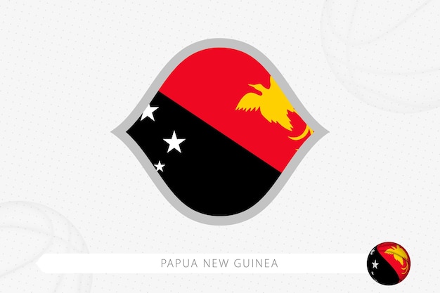 Флаг Папуа-Новой Гвинеи для баскетбольных соревнований на сером фоне баскетбола.