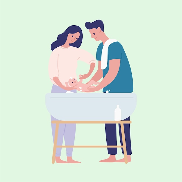 parents bathing their newborn baby