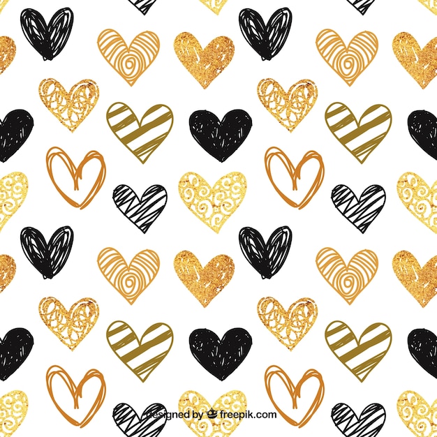 Pattern of hand-painted golden and black hearts