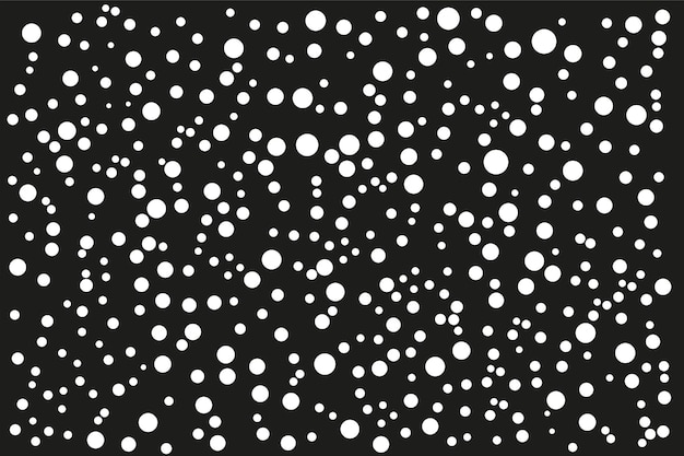 pattern of white dots of different sizes on a black background